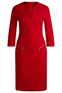 V-neck dress with zipped pockets and cropped sleeves