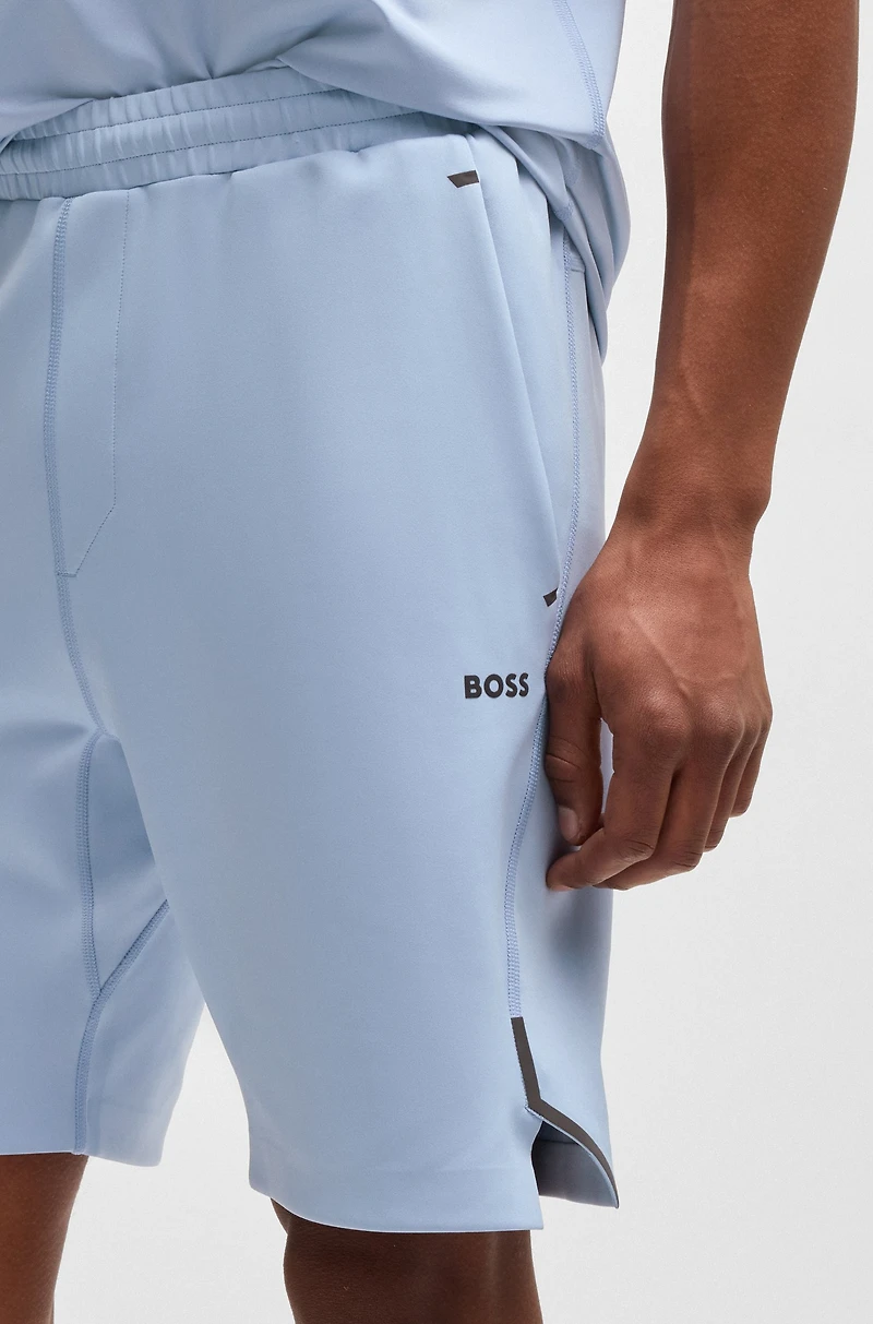 Active stretch shorts with decorative reflective details
