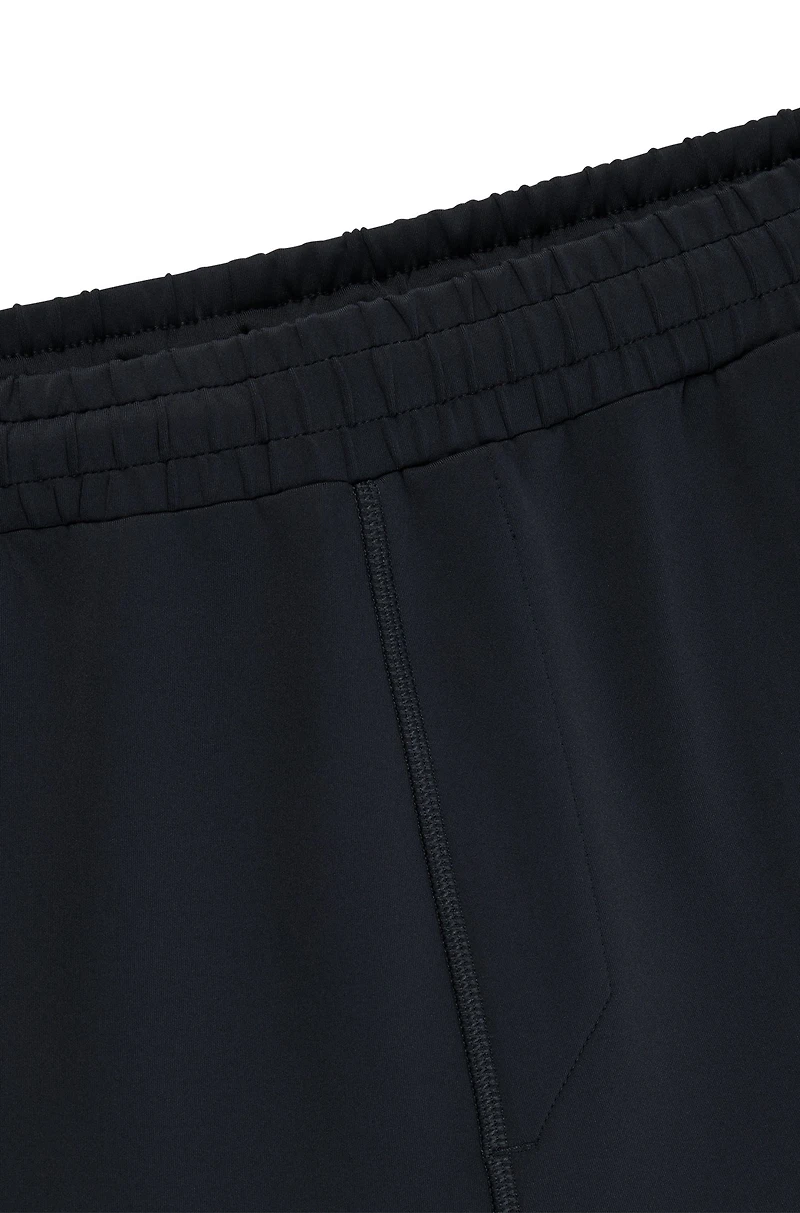 Quick-dry trousers with reflective branding