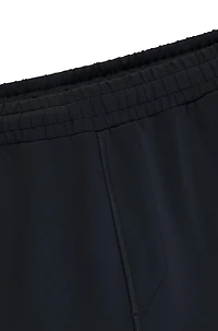 Quick-dry trousers with reflective branding