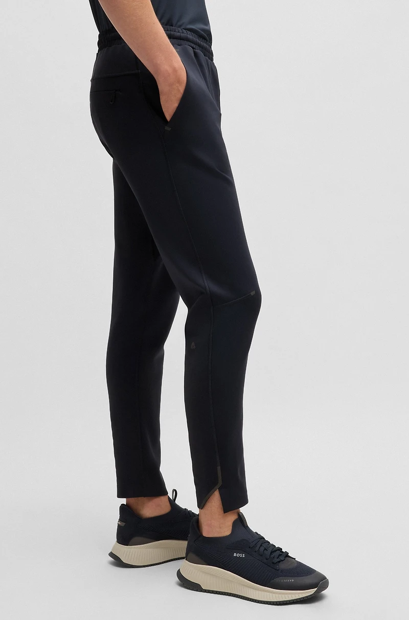 Quick-dry trousers with reflective branding