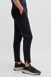 Quick-dry trousers with reflective branding