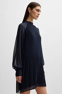 High-neck dress with plissé pleats and sheer sleeves