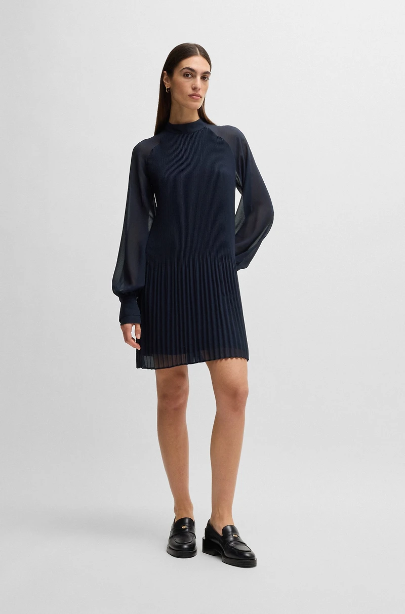 High-neck dress with plissé pleats and sheer sleeves