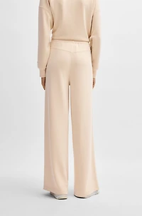 Wide-leg tracksuit bottoms with pleat details