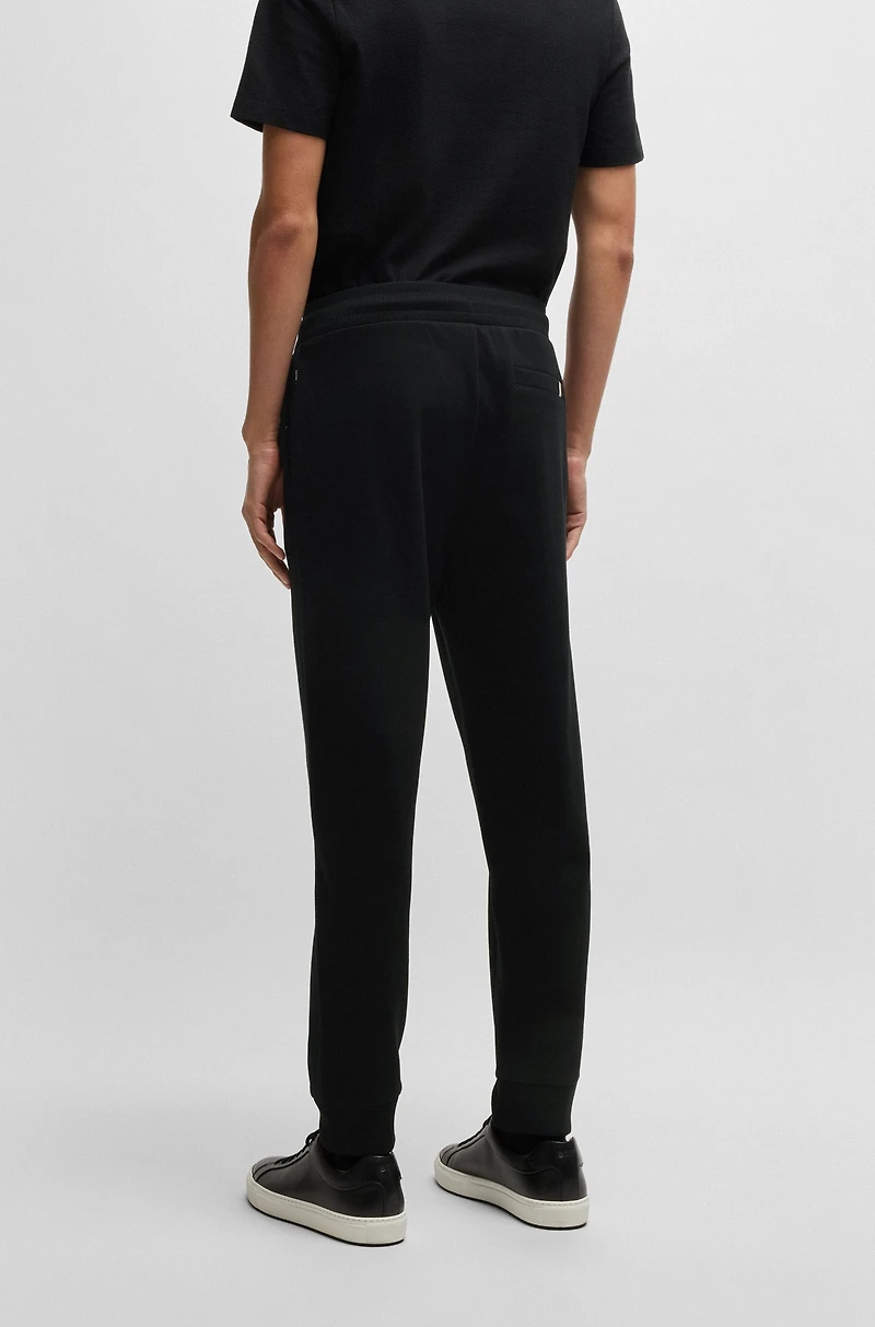 Mercerized-cotton tracksuit bottoms with stripe waistband