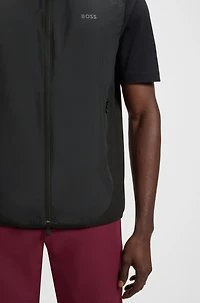 Water-repellent golf vest with decorative reflective details