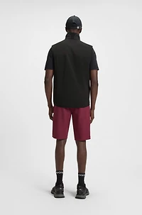 Water-repellent golf vest with decorative reflective details