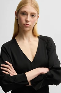 V-neck dress with button cuffs