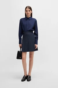 Pleat-front skirt with buttoned waist