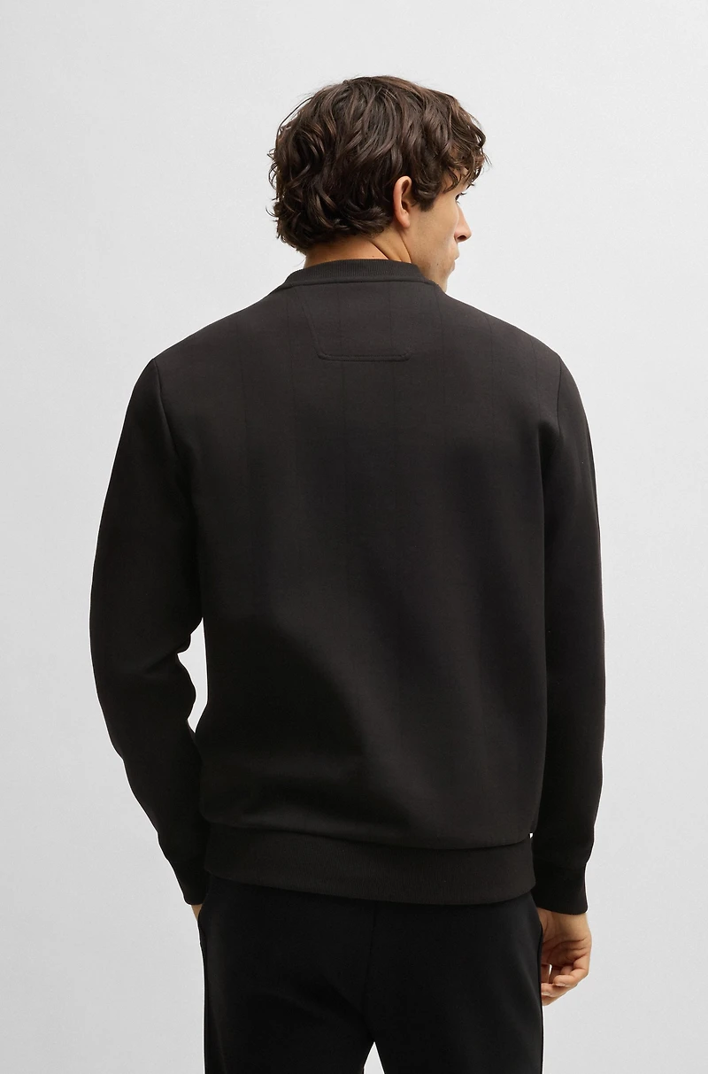 Sweatshirt with drop-needle stitching