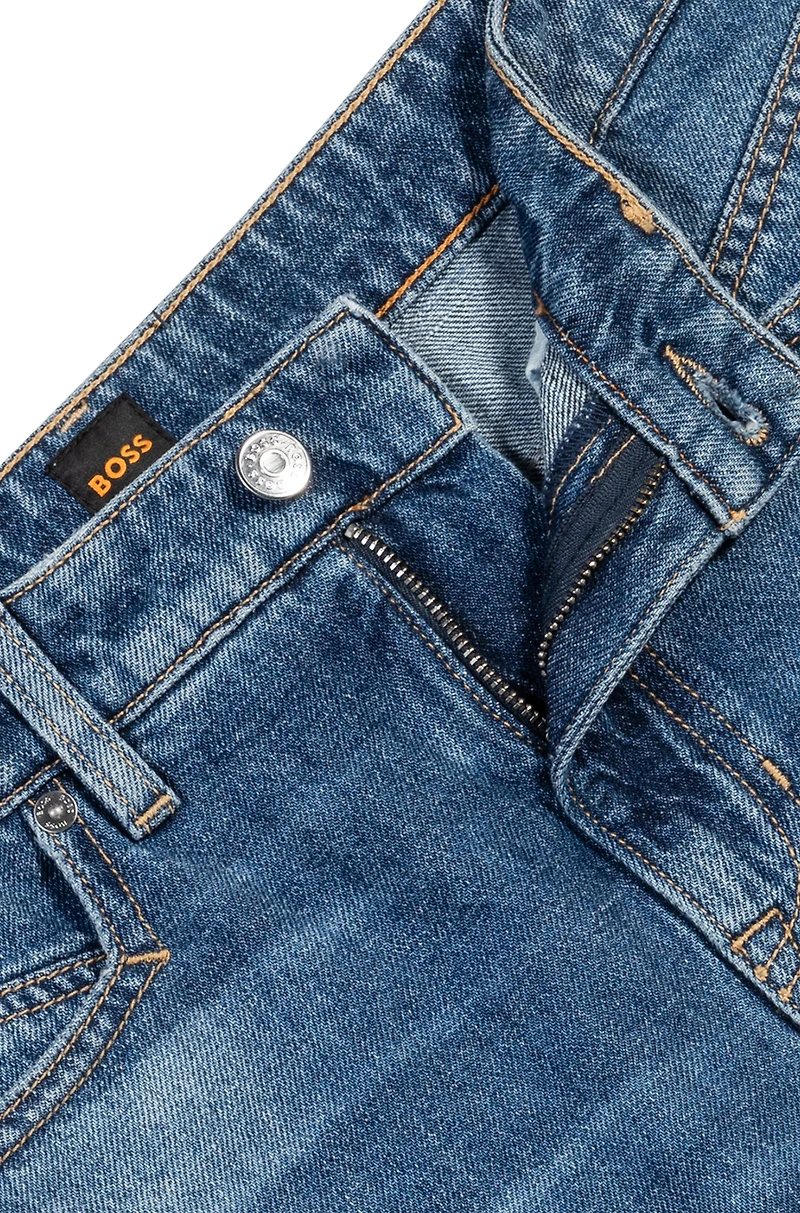 Knee-length denim shorts with raw hem