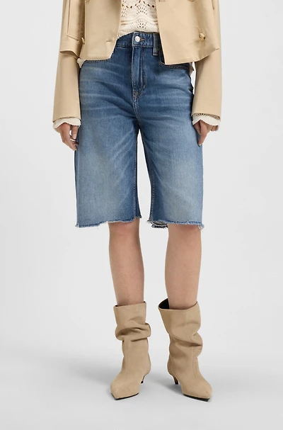 Knee-length denim shorts with raw hem