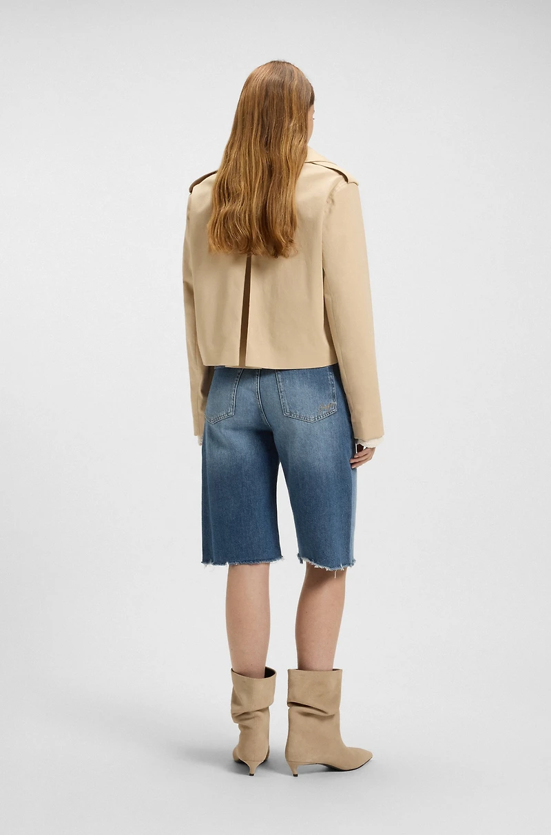 Knee-length denim shorts with raw hem