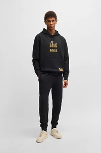 BOSS x NFL stretch hoodie with gold-tone artwork