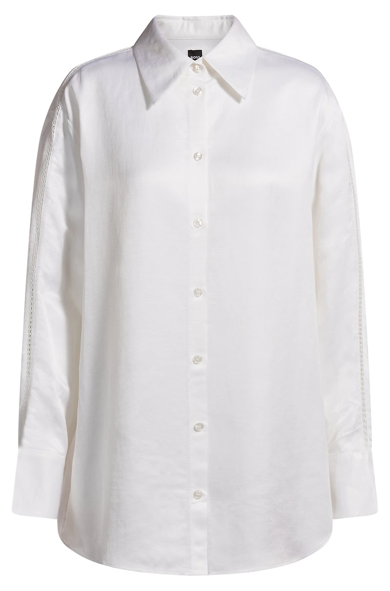 Tailored blouse with crochet-effect trims