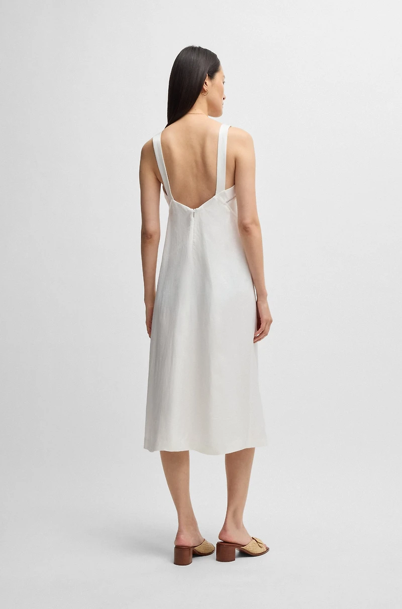 Summery dress with wide straps and seaming detail