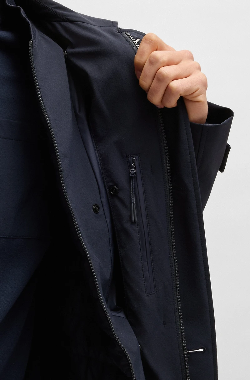 Travel-friendly stretch-softshell coat with detachable inner gilet