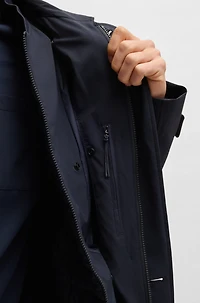 Travel-friendly stretch-softshell coat with detachable inner gilet