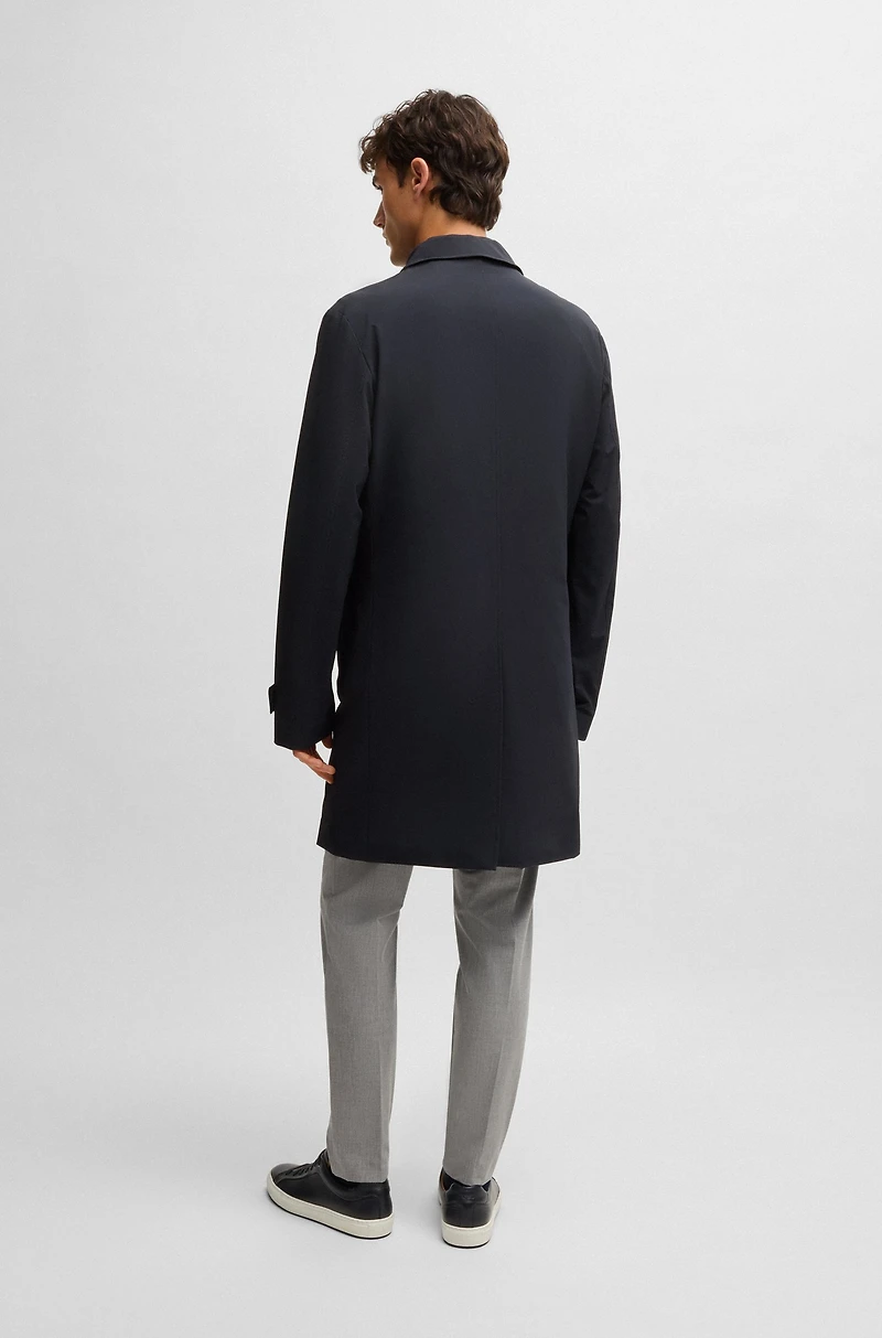 Travel-friendly stretch-softshell coat with detachable inner gilet