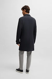 Travel-friendly stretch-softshell coat with detachable inner gilet