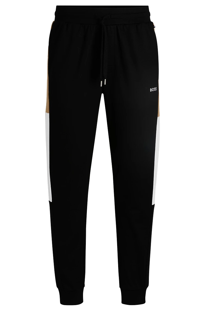 Cotton-terry tracksuit bottoms with contrast side panels