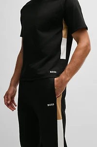 Cotton-terry tracksuit bottoms with contrast side panels