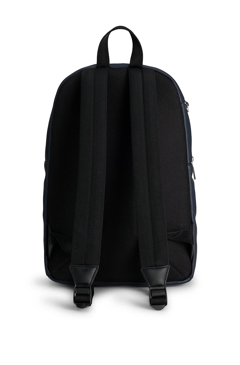 Textured backpack with logo hardware
