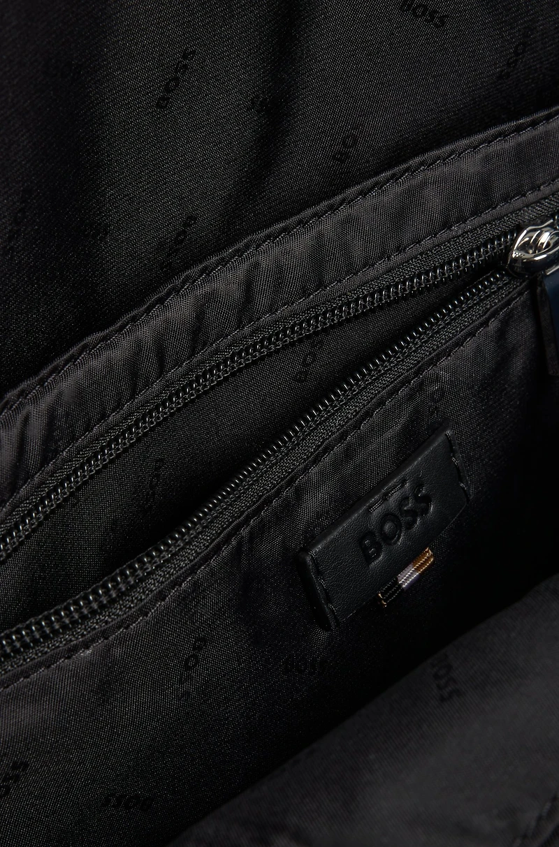 Textured backpack with logo hardware