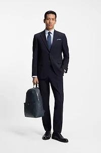 Textured backpack with logo hardware