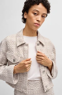 Cropped tweed jacket with metallic buttons