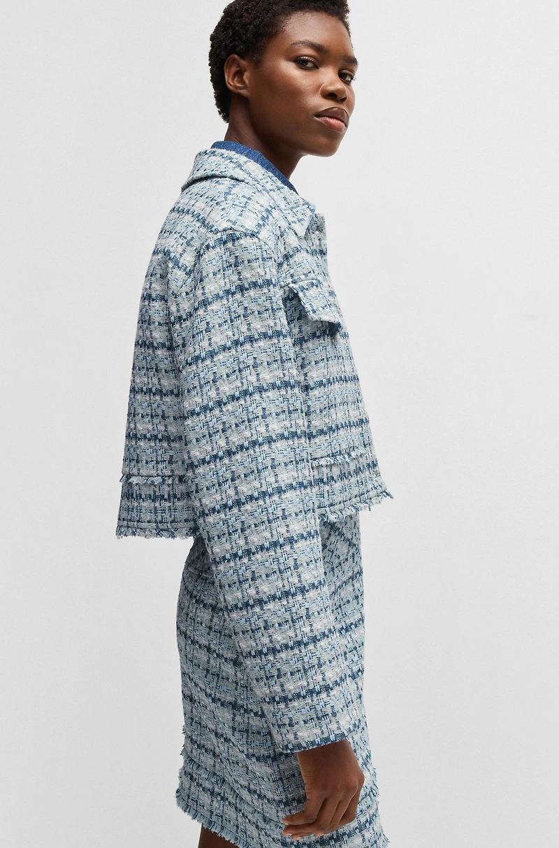 Cropped tweed jacket with metallic buttons