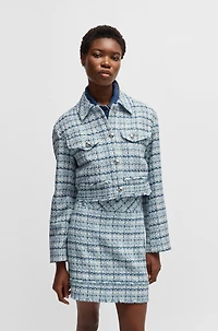 Cropped tweed jacket with metallic buttons