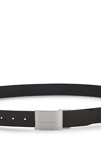 Reversible-leather belt with pin and plaque buckles