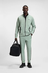 Circle-jacquard zip-up sweatshirt with side stripes