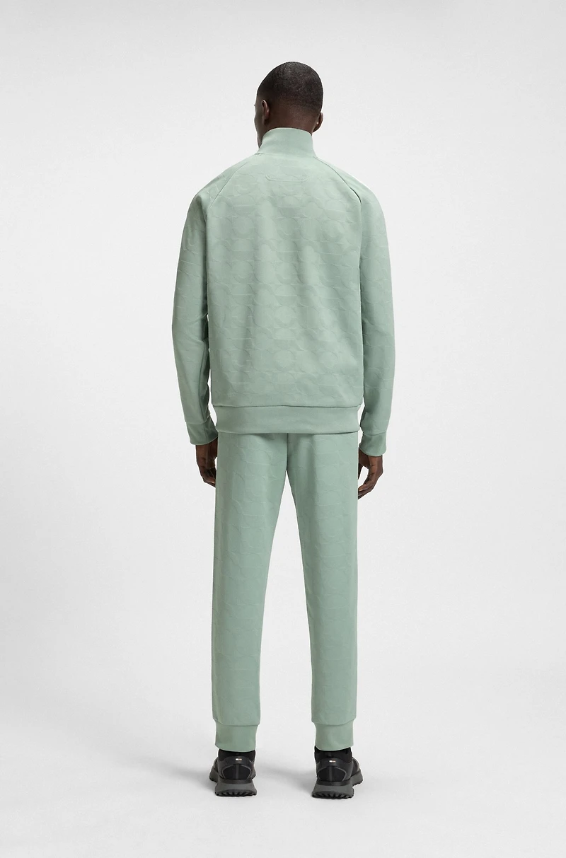Circle-jacquard zip-up sweatshirt with side stripes