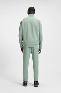 Circle-jacquard zip-up sweatshirt with side stripes