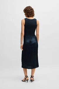 Knitted dress with lustrous structured skirt