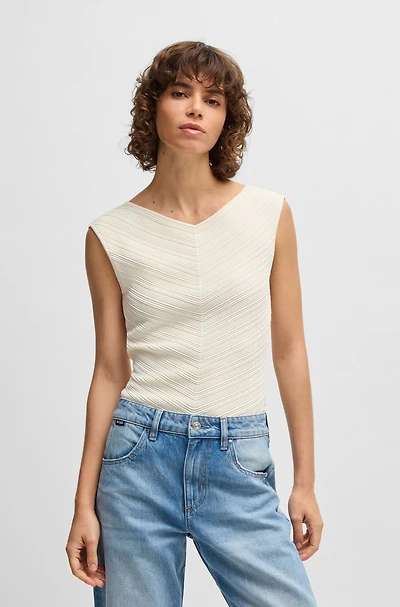 V-neck top with knitted structure