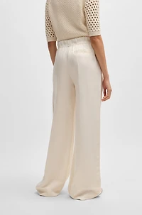 Relaxed-fit trousers with wide leg