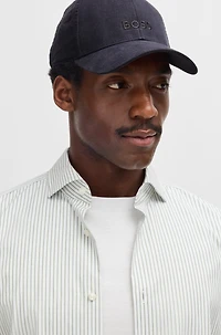 Linen cap with embroidered logo
