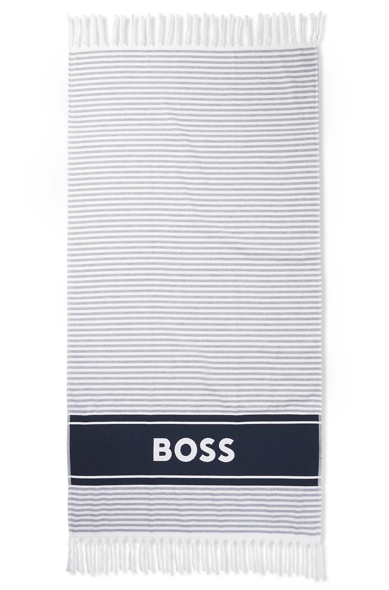 Beach towel in cotton with stripes and logo