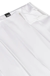 Relaxed-fit trousers with front pleats