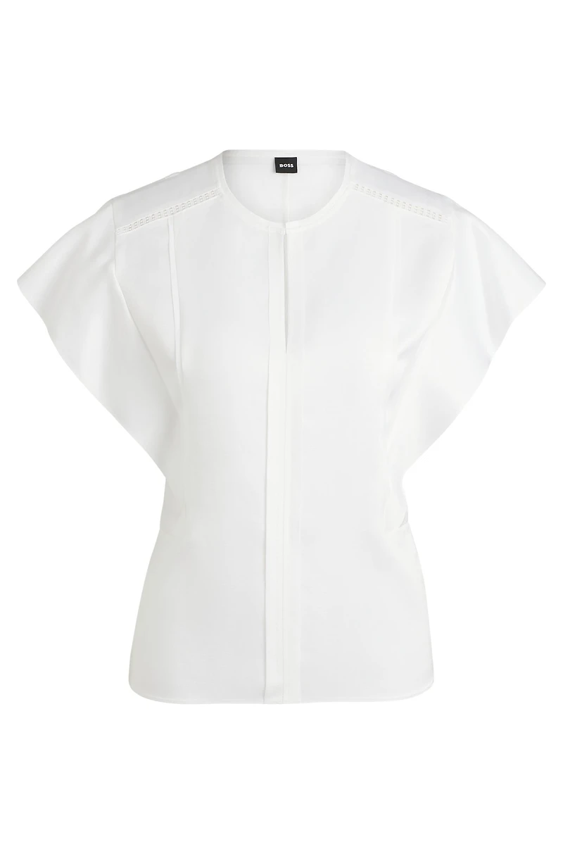 Frill-sleeve blouse with crochet-style trims