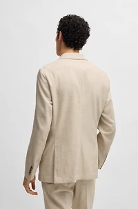 Two-piece suit patterned tweed