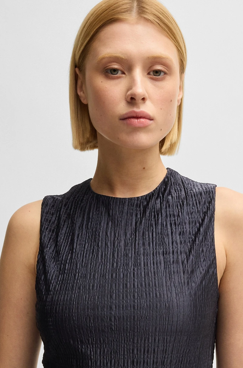 Plissé dress with layered effect