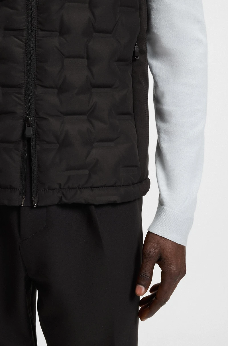 Down-filled gilet with welded-logo pattern