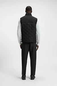 Down-filled gilet with welded-logo pattern