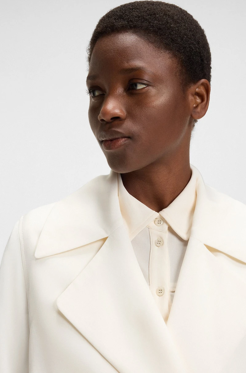 Trench coat with fabric belt