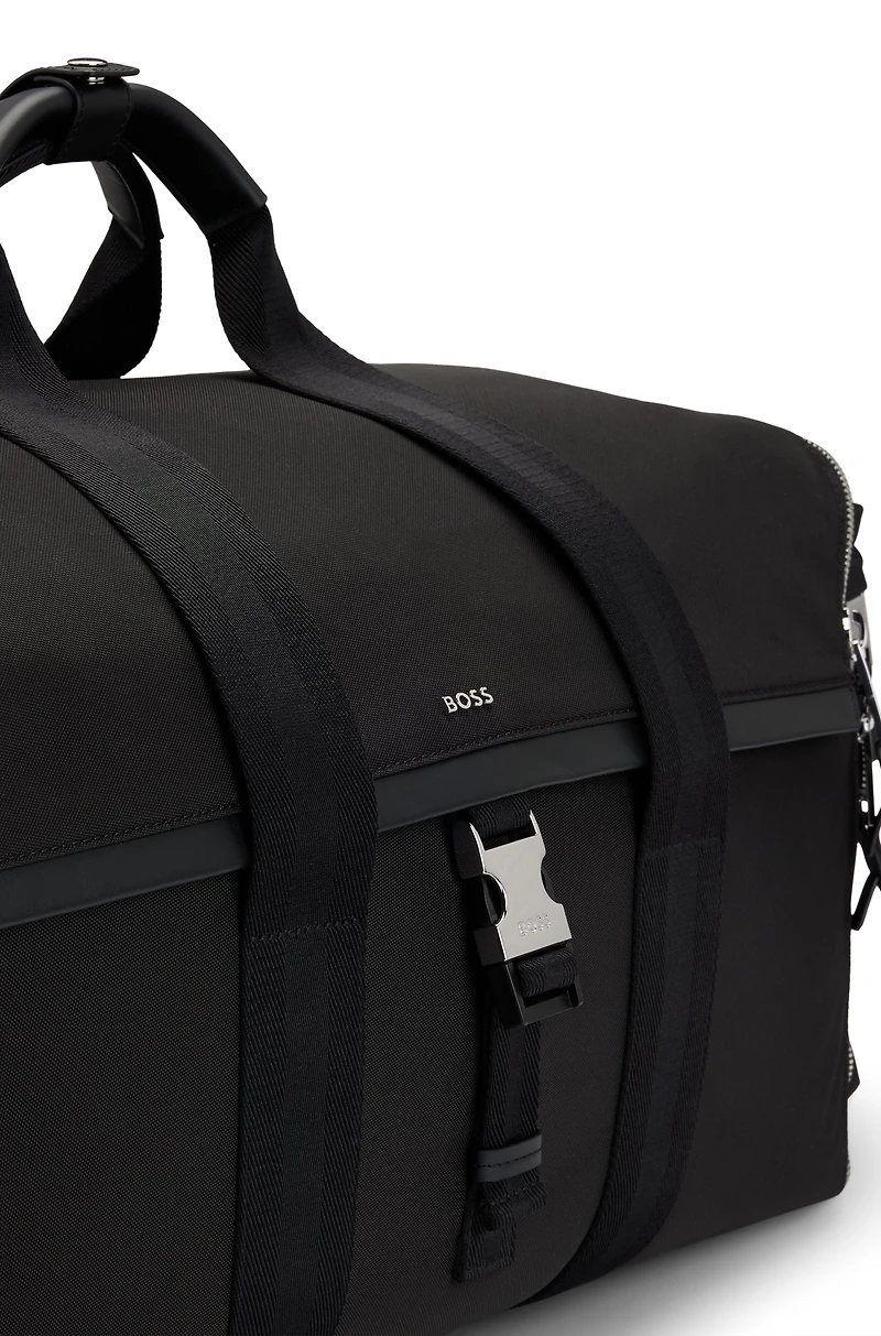 Holdall with zipped suit compartment
